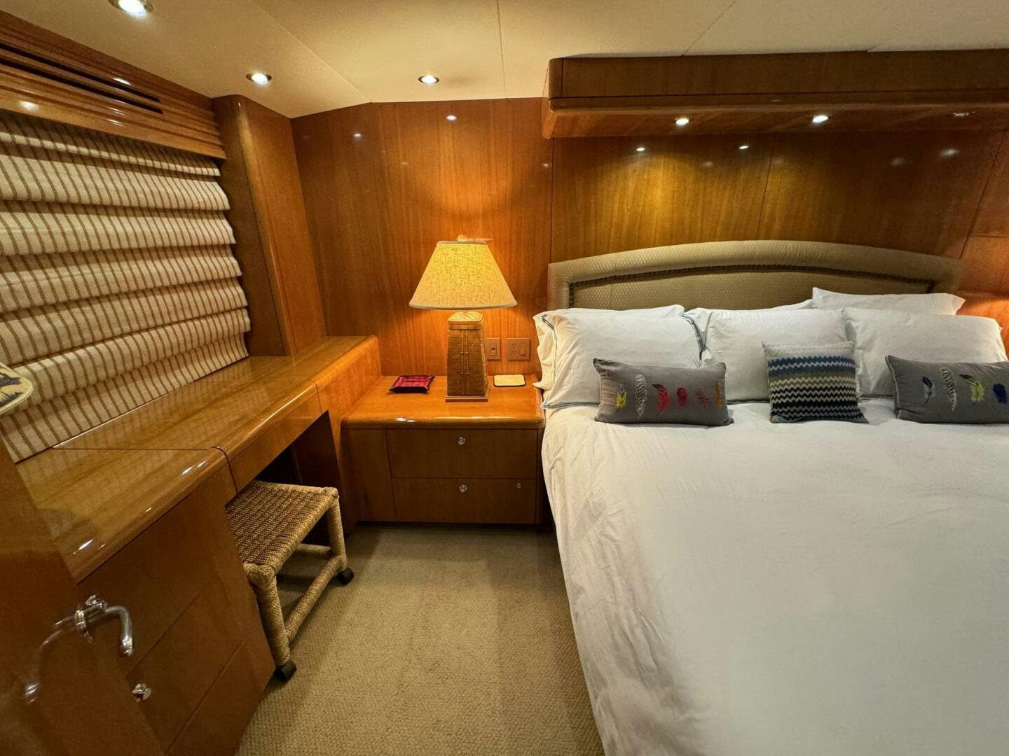 a room with a bed and a desk aboard MRS. Z Yacht for Sale