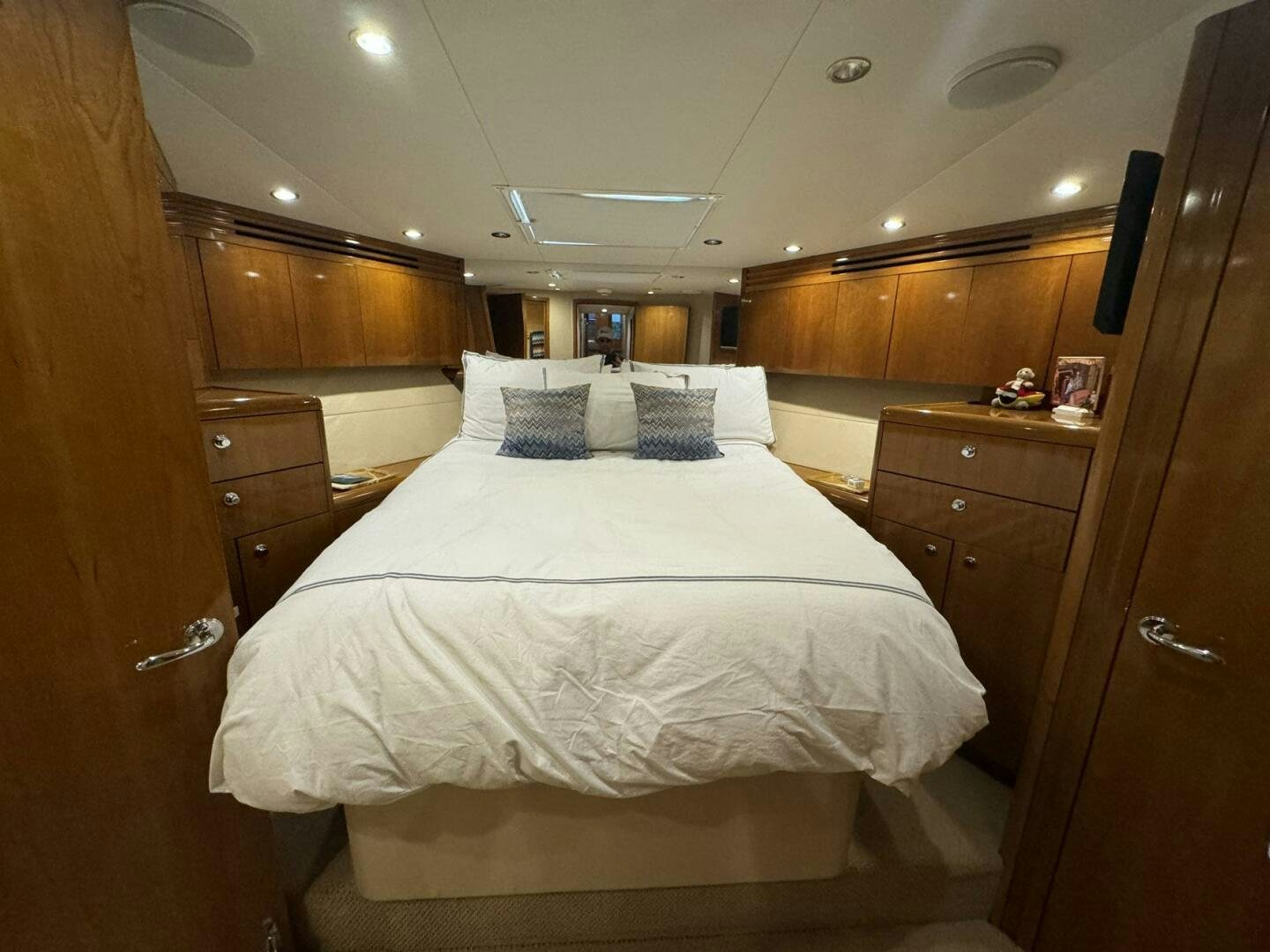 a bed in a room aboard MRS. Z Yacht for Sale