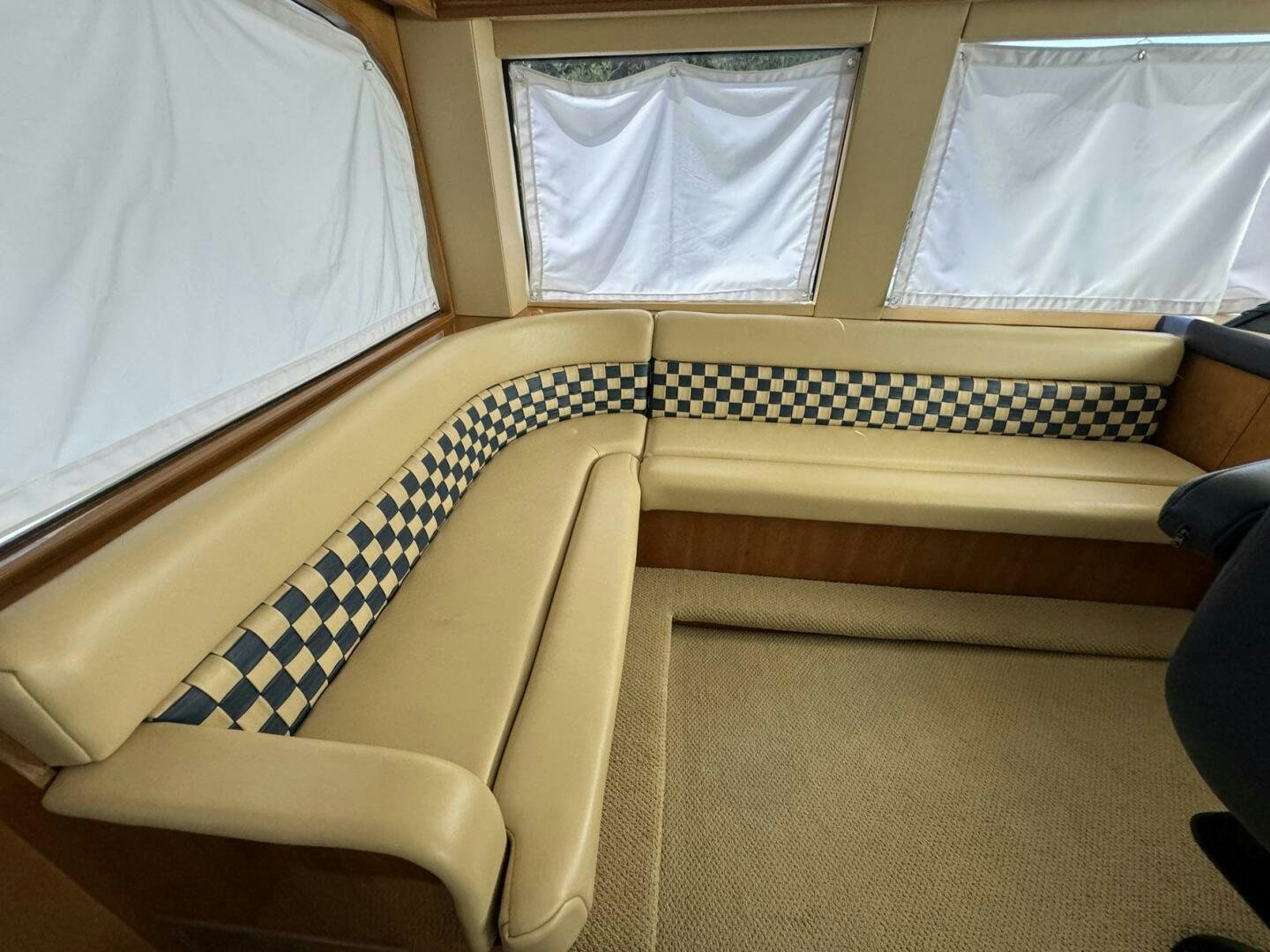 a bed with a white sheet aboard MRS. Z Yacht for Sale