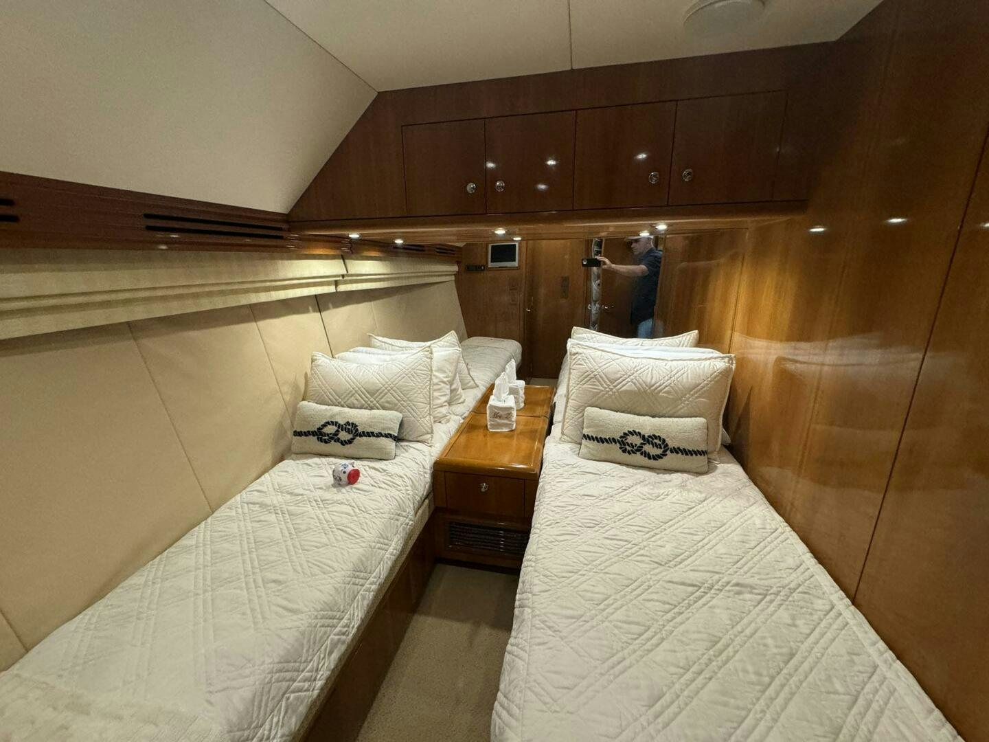 a couple of beds in a hotel room aboard MRS. Z Yacht for Sale