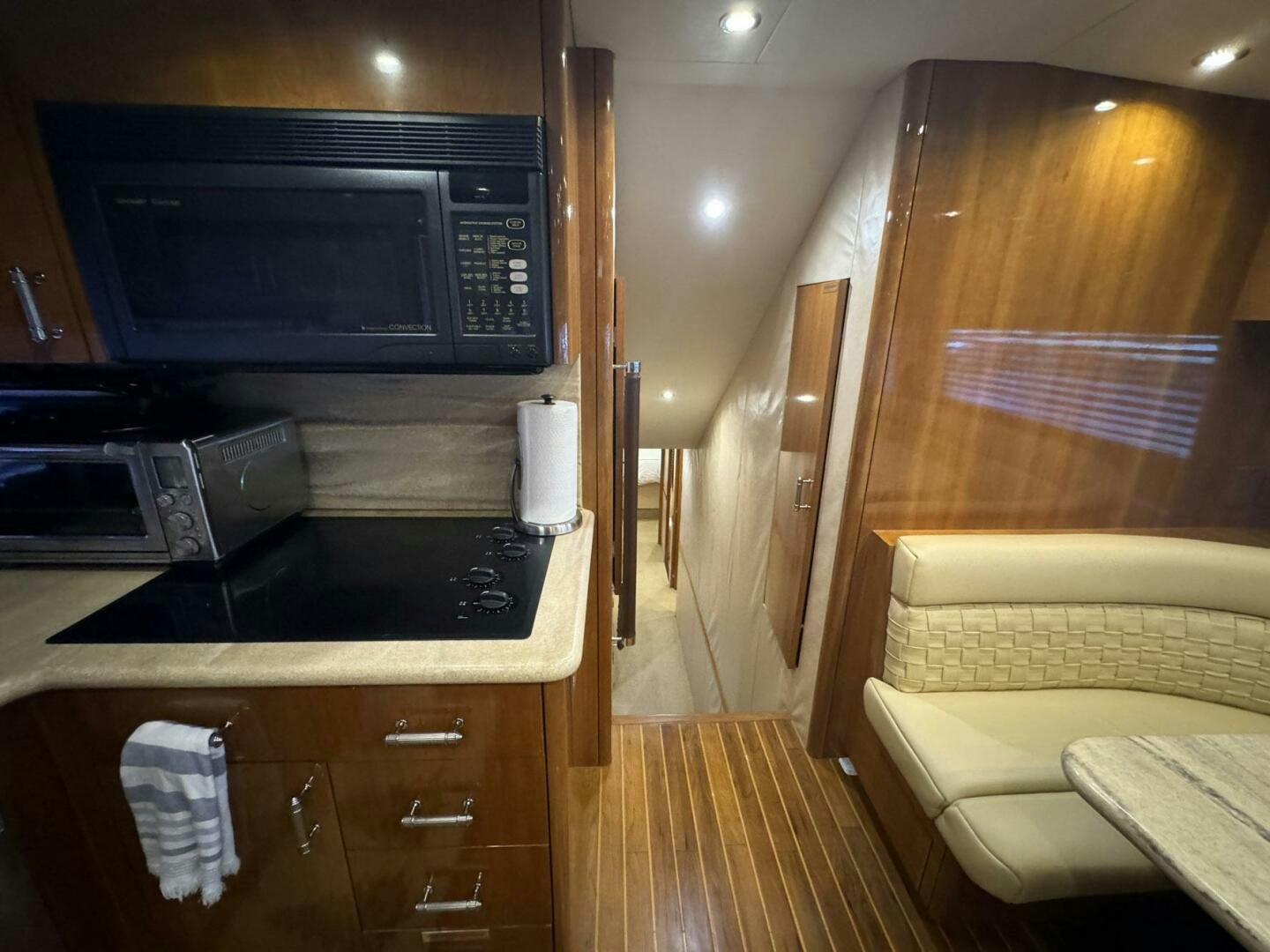 a kitchen with a microwave oven and a microwave aboard MRS. Z Yacht for Sale