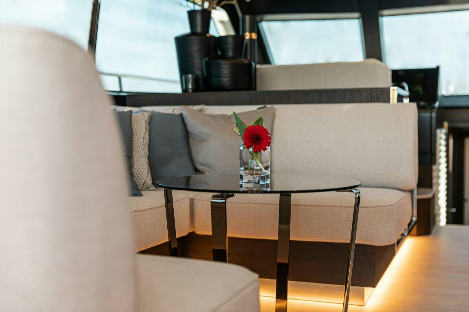 a flower in a vase on a table aboard JUST THE TWO OF US Yacht for Sale