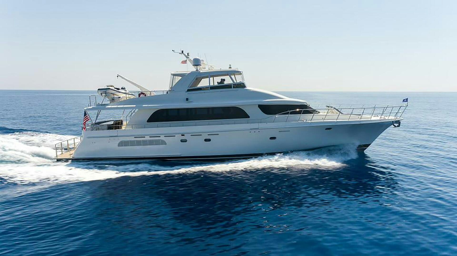 a white yacht on the water aboard LADY LORRAINE Yacht for Sale