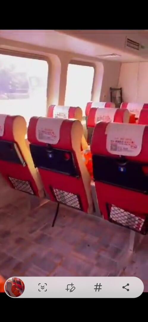 a red and black toy train aboard TING HONG Yacht for Sale