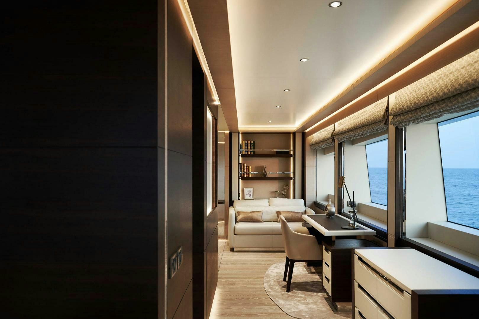 a room with a desk and a window aboard PANTERA 44 Yacht for Sale