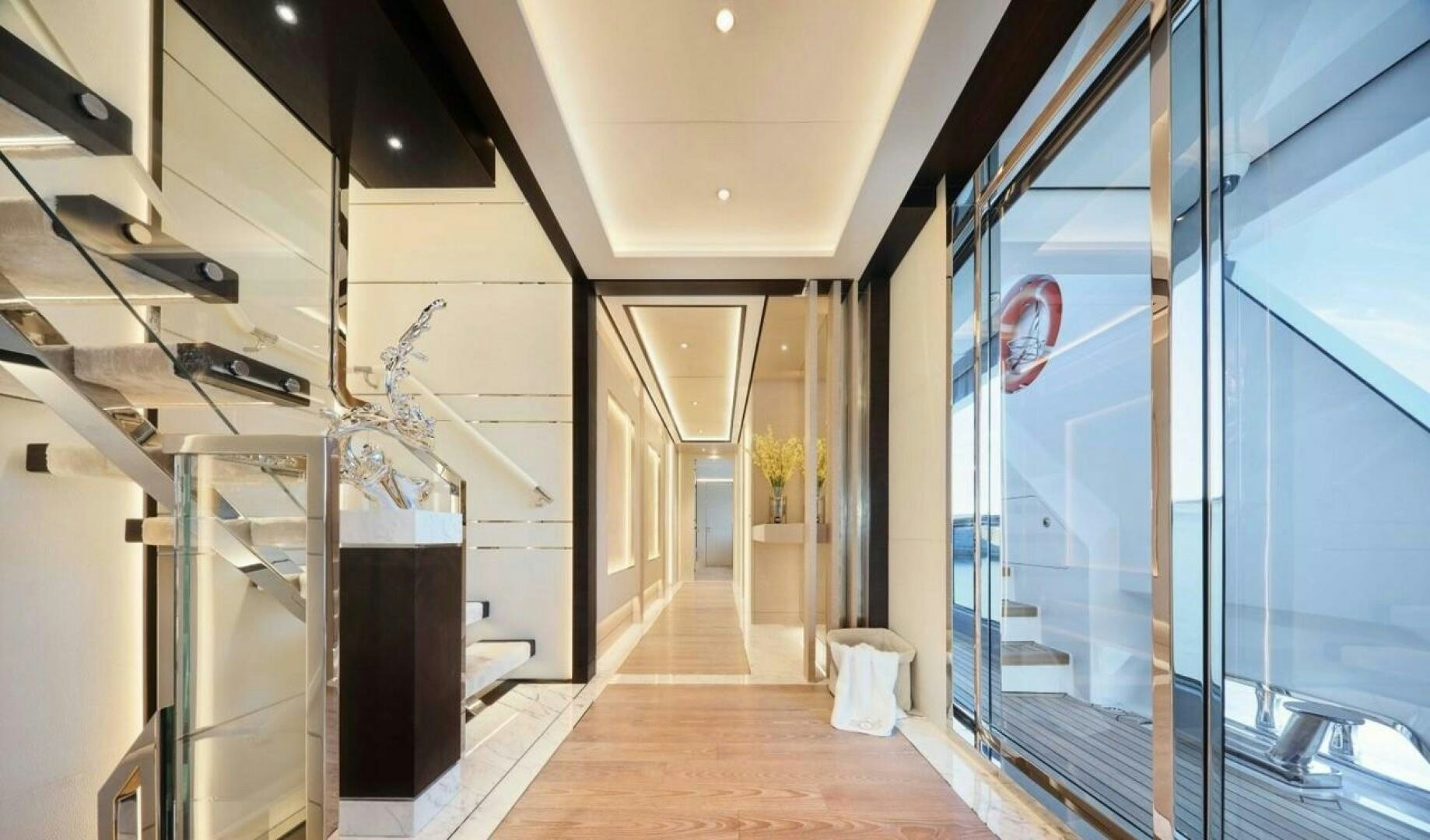 a hallway with glass doors aboard PANTERA 44 Yacht for Sale