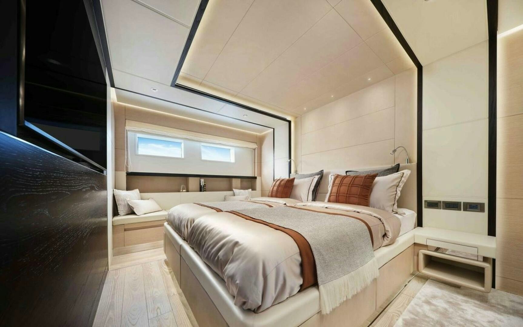 a room with a bed and a window aboard PANTERA 44 Yacht for Sale