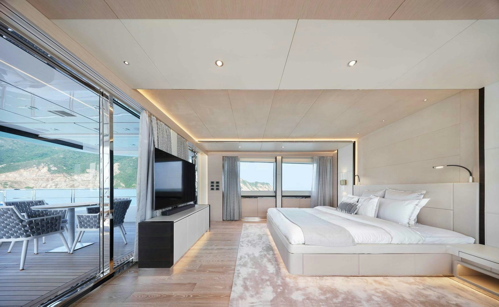 a large white bed in a room aboard PANTERA 44 Yacht for Sale
