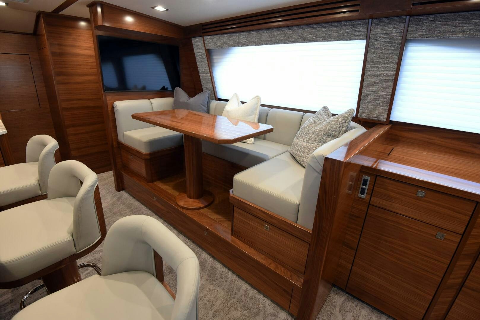 a room with a table and chairs aboard AMANDA P Yacht for Sale