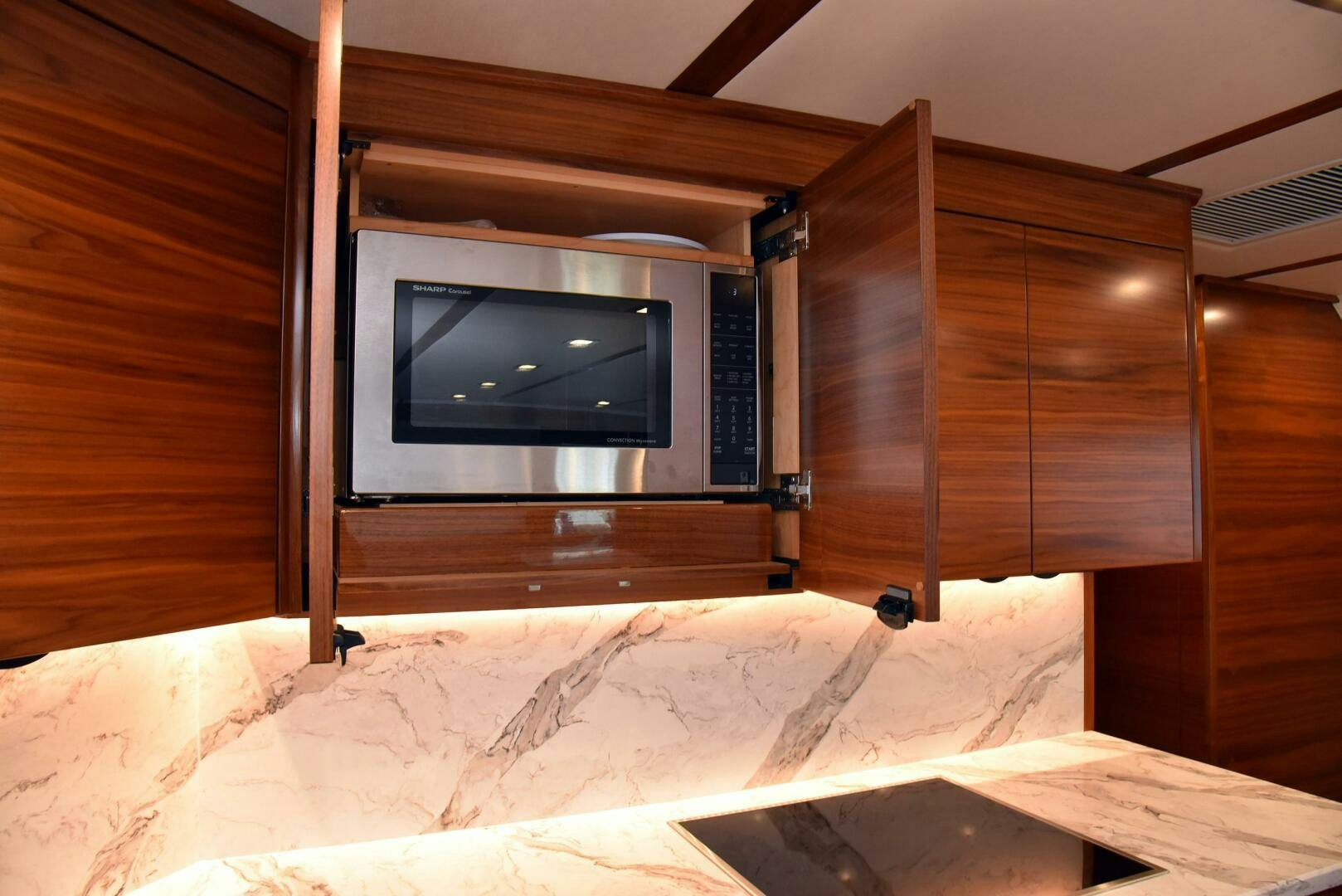 a tv in a wooden room aboard AMANDA P Yacht for Sale