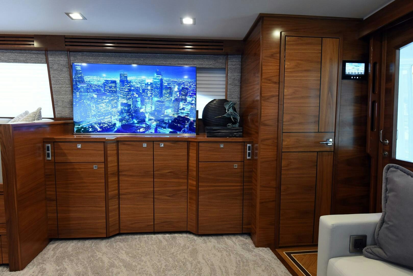 a room with a tv and a cabinet aboard AMANDA P Yacht for Sale