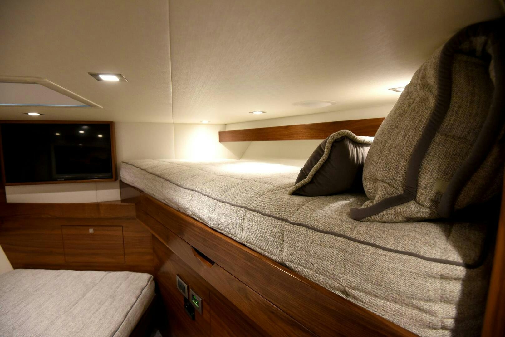 a couch with a television in the background aboard AMANDA P Yacht for Sale