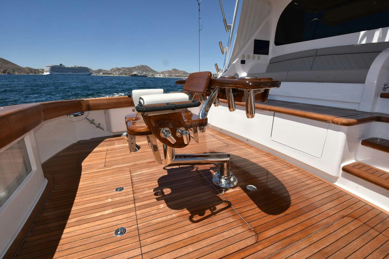 a deck with a large boat on it and a large body of water in the background aboard AMANDA P Yacht for Sale