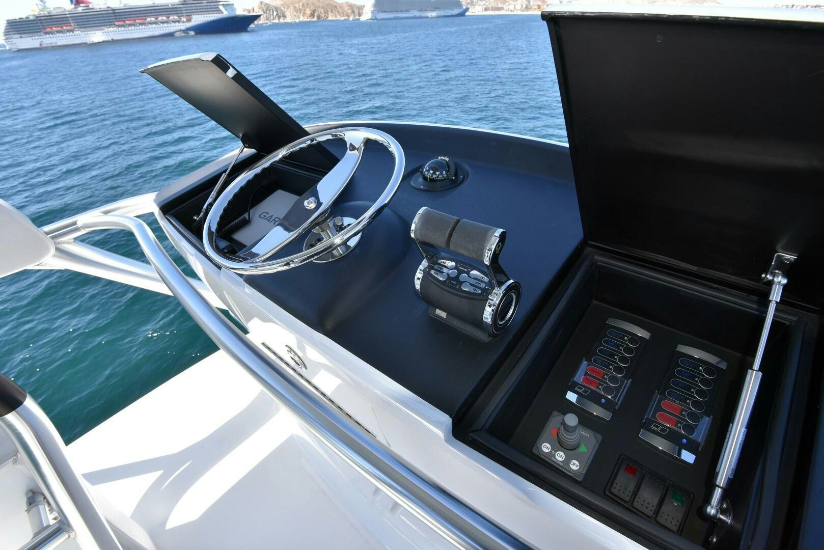 the steering wheel and dashboard of a car aboard AMANDA P Yacht for Sale
