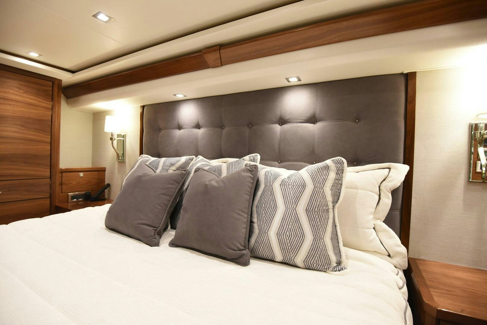 a bed with pillows aboard AMANDA P Yacht for Sale