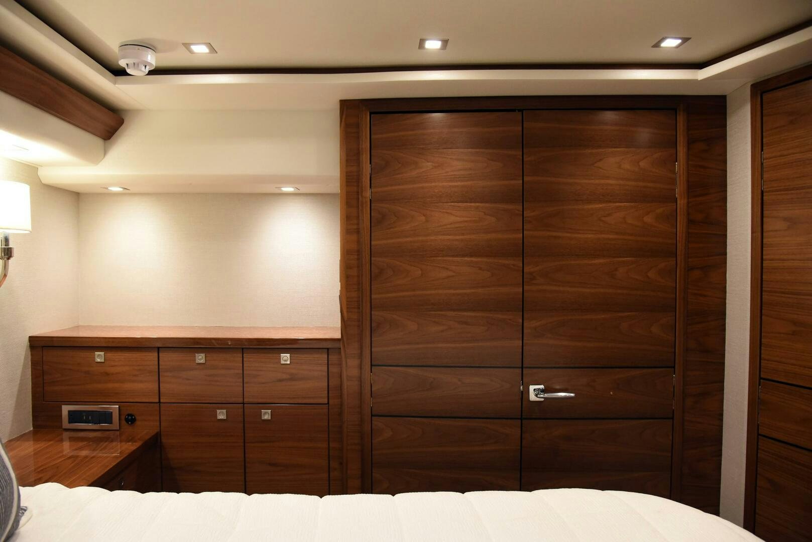 a room with wooden cabinets aboard AMANDA P Yacht for Sale