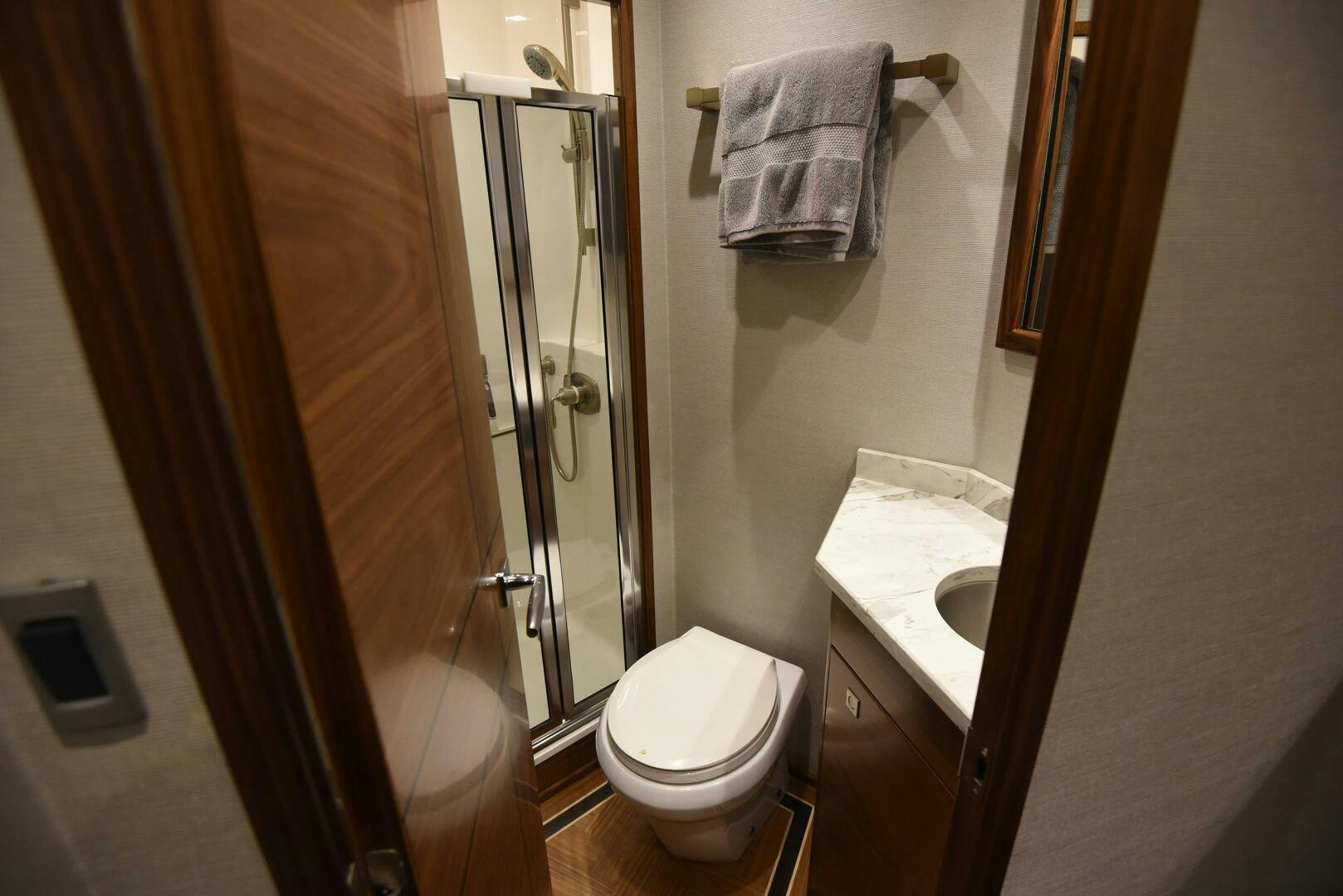 a bathroom with a sink and toilet aboard AMANDA P Yacht for Sale