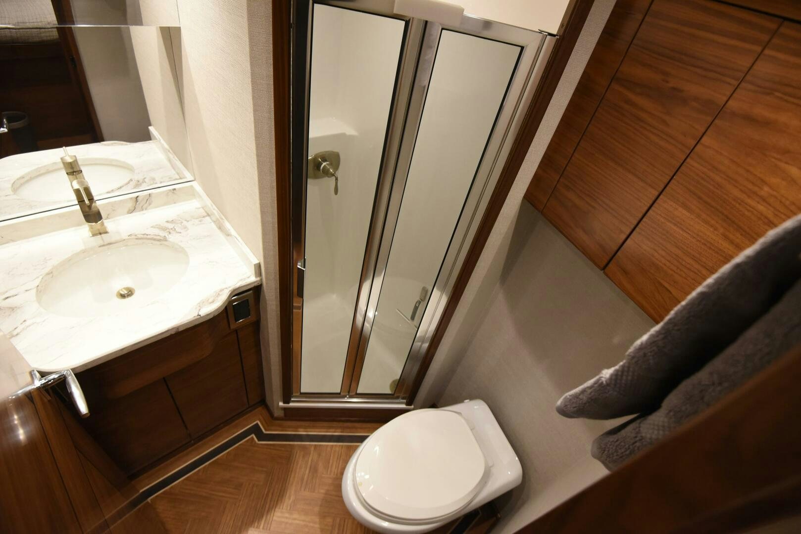 a bathroom with a sink and a mirror aboard AMANDA P Yacht for Sale