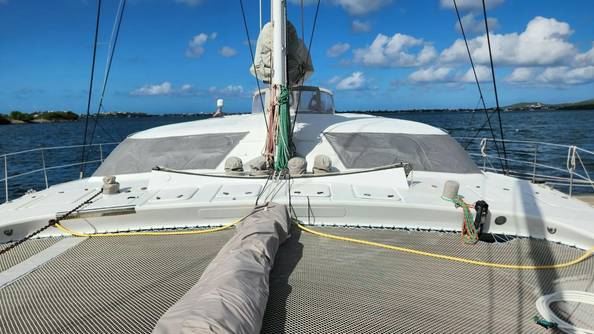a boat on the water aboard FAT CAT Yacht for Sale