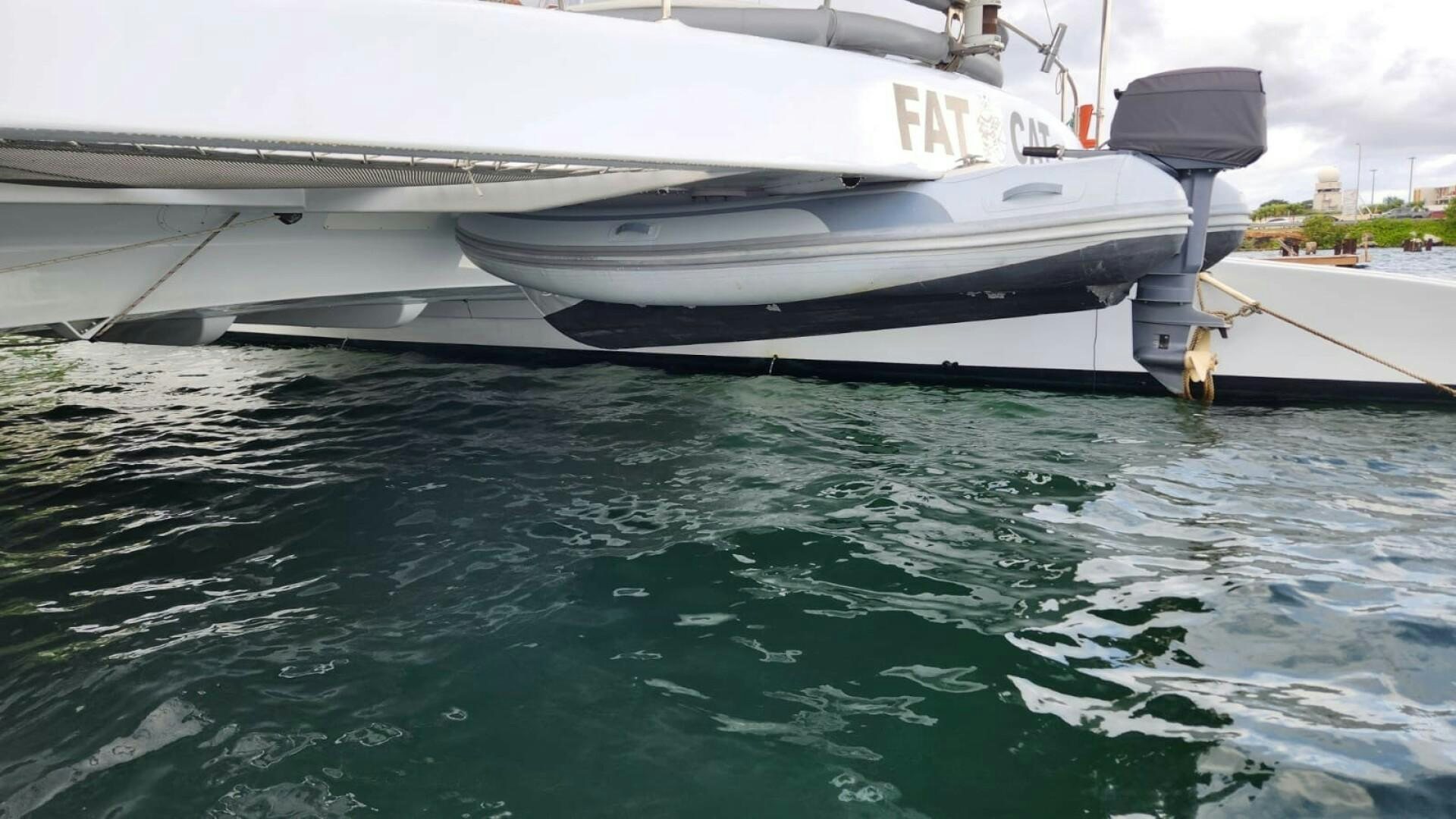 a boat on the water aboard FAT CAT Yacht for Sale
