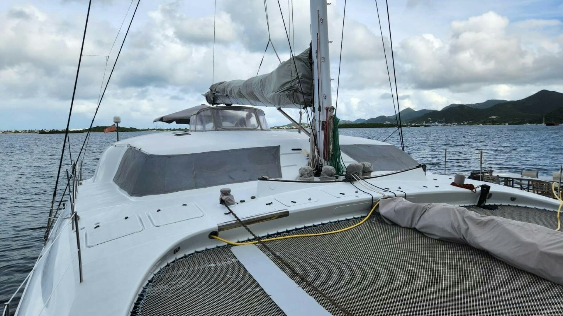 a boat on the water aboard FAT CAT Yacht for Sale