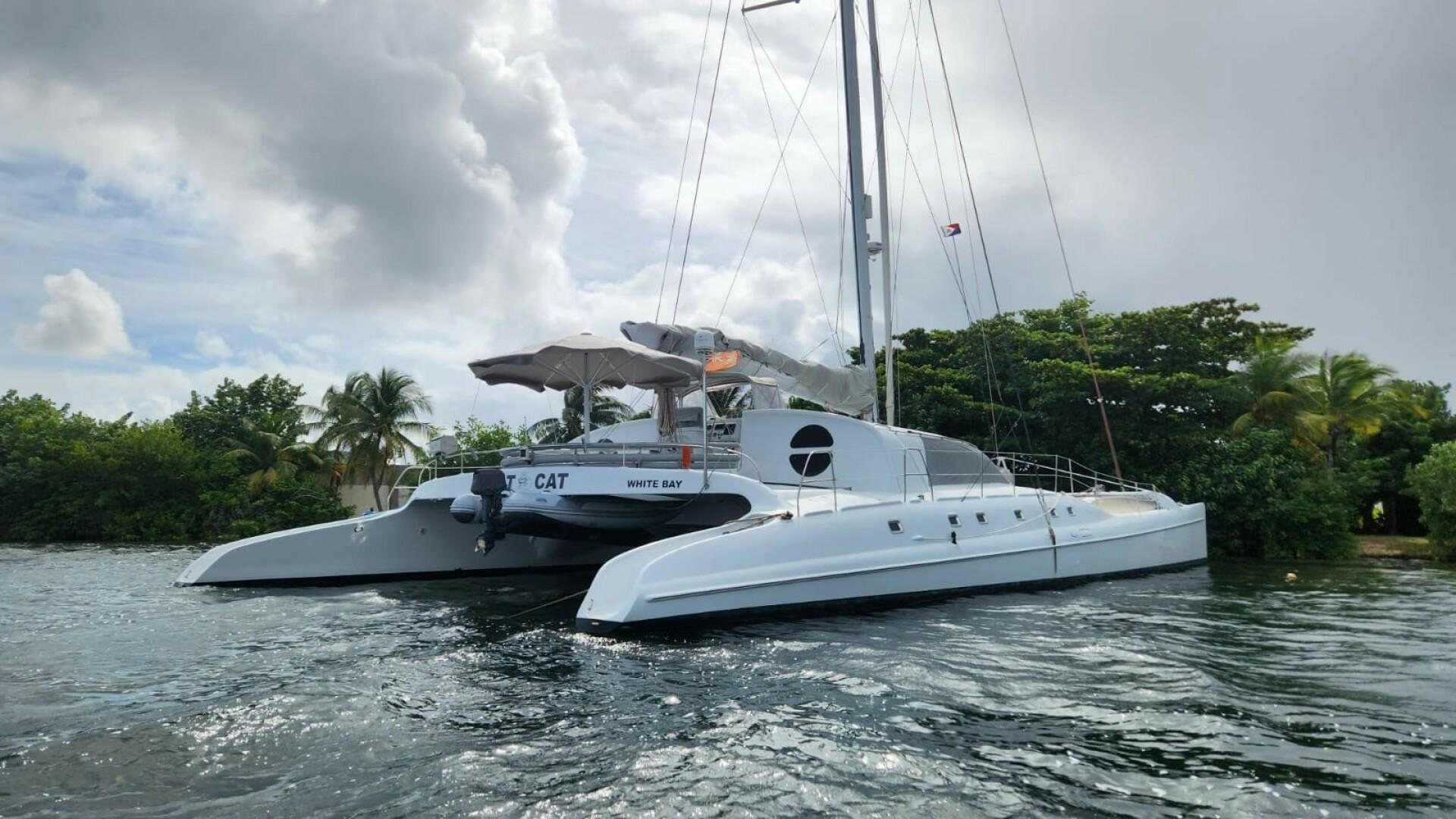 a boat on the water aboard FAT CAT Yacht for Sale