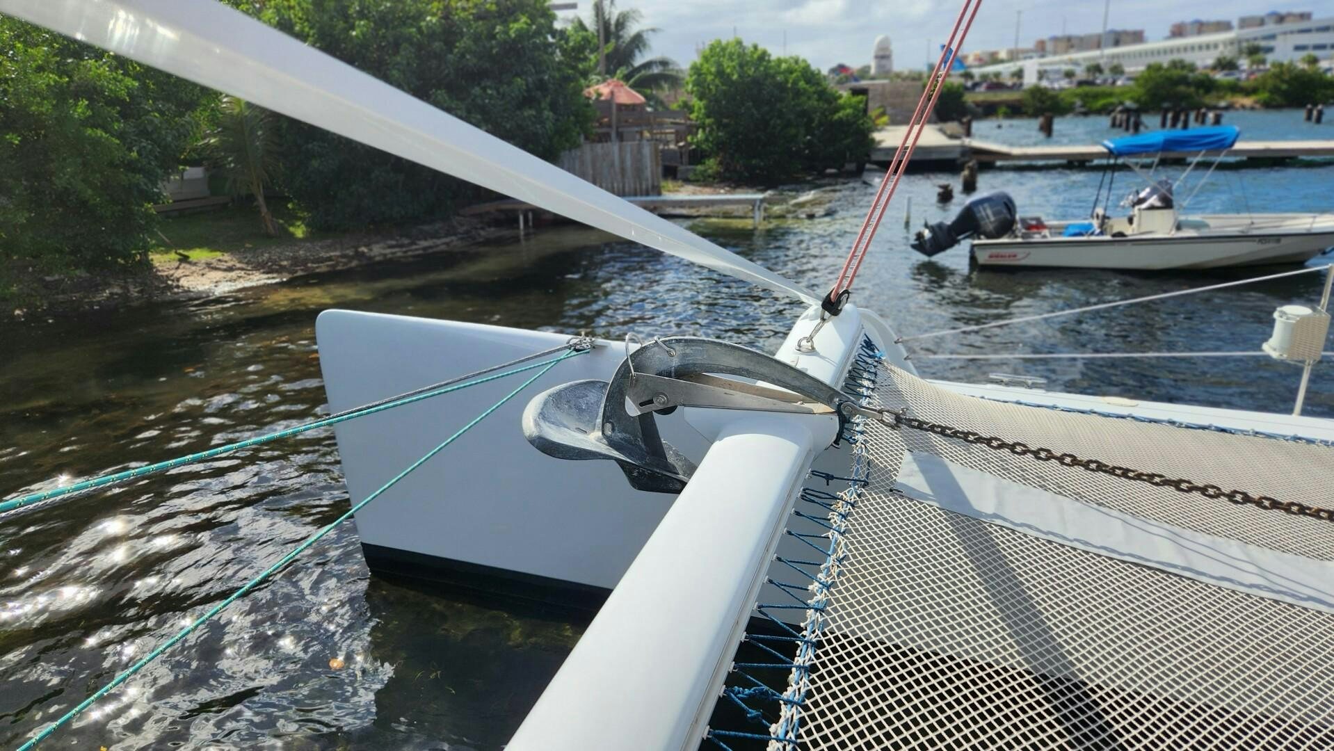 a boat with a rope attached to it aboard FAT CAT Yacht for Sale