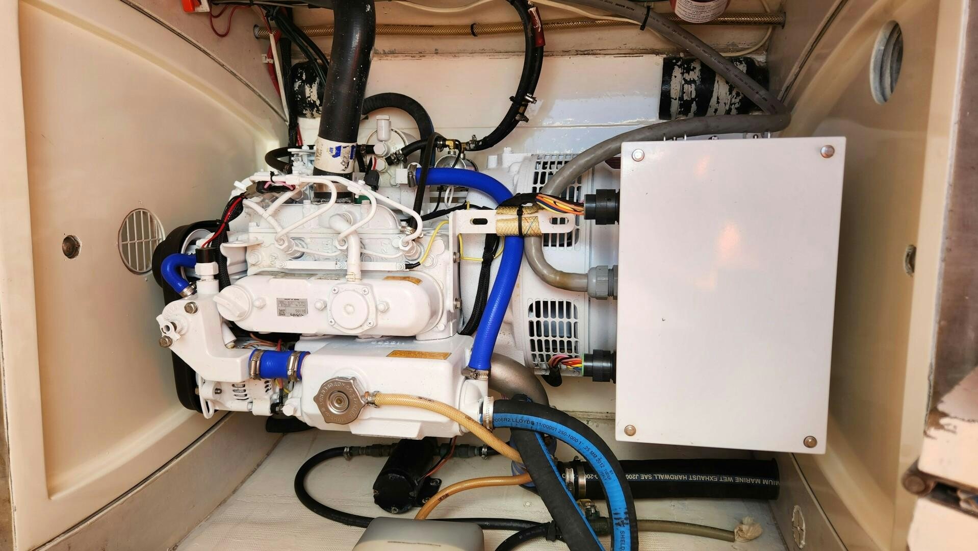 a machine with wires and a white board aboard FAT CAT Yacht for Sale