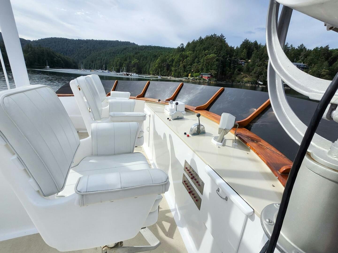 a boat with chairs on it aboard PIONEER Yacht for Sale