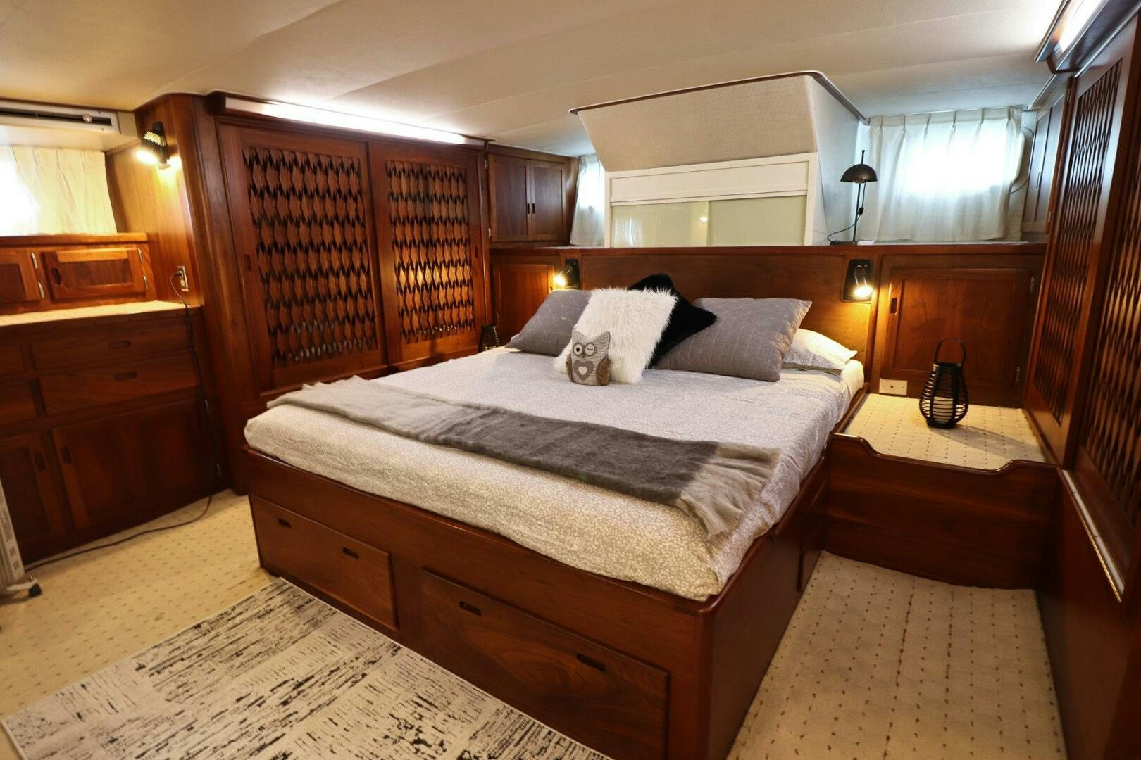 a bed in a room aboard PIONEER Yacht for Sale
