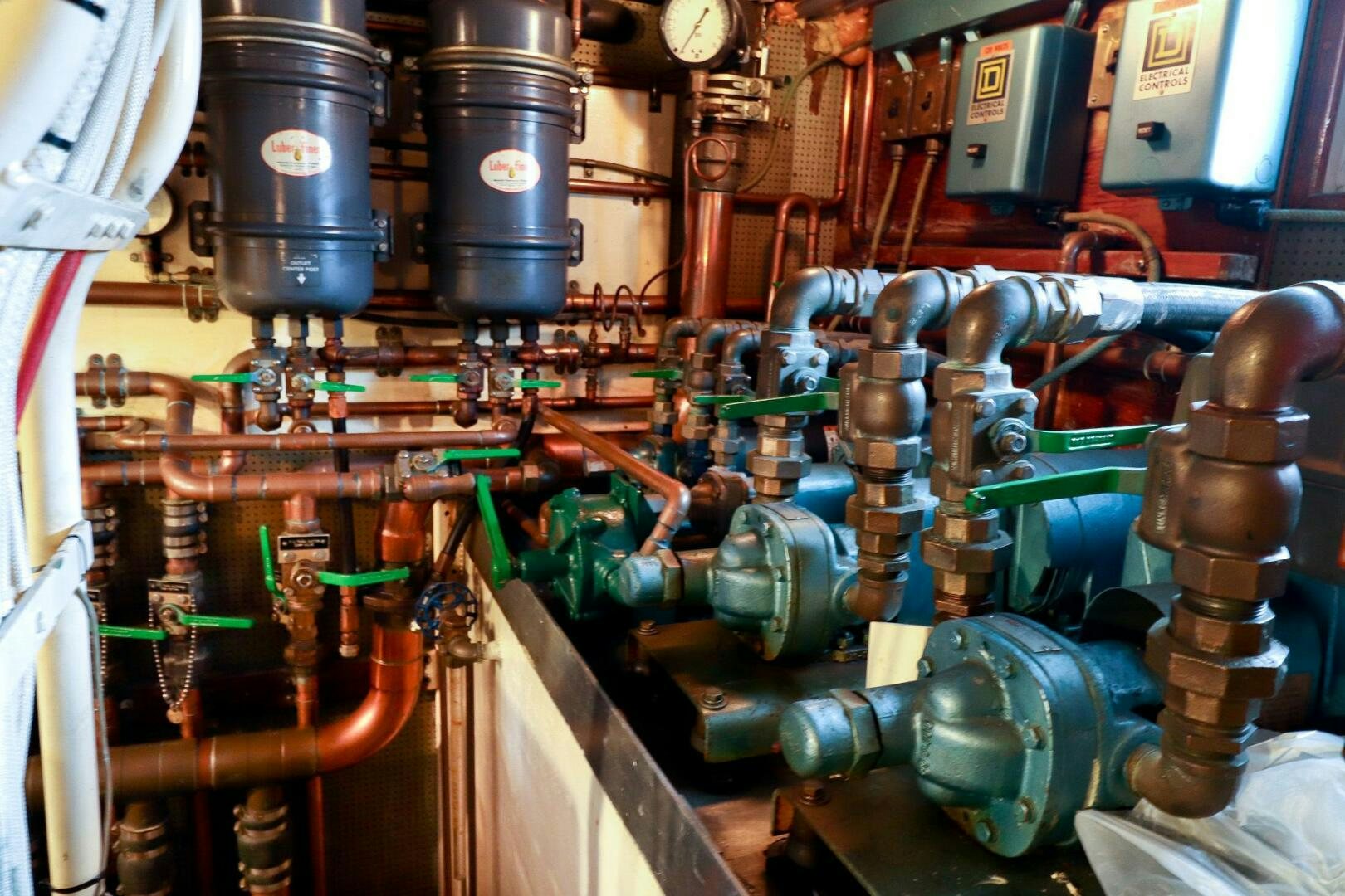 a large machine with pipes aboard PIONEER Yacht for Sale