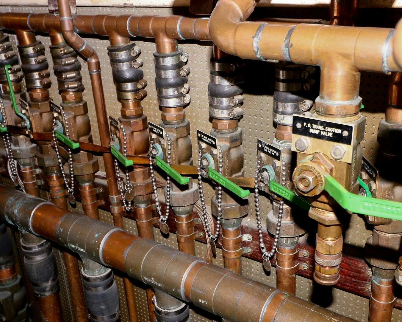 a group of pipes with wires aboard PIONEER Yacht for Sale