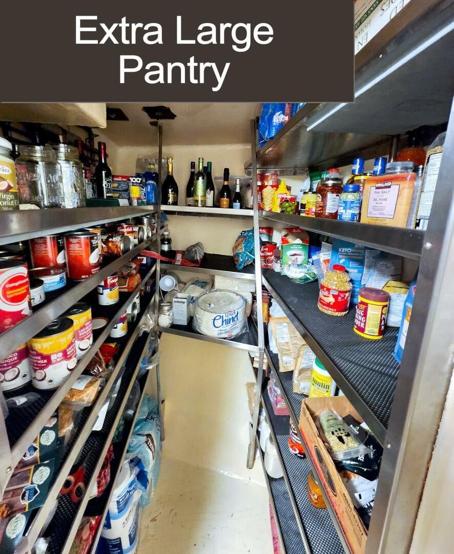 a store with shelves of food aboard PIONEER Yacht for Sale