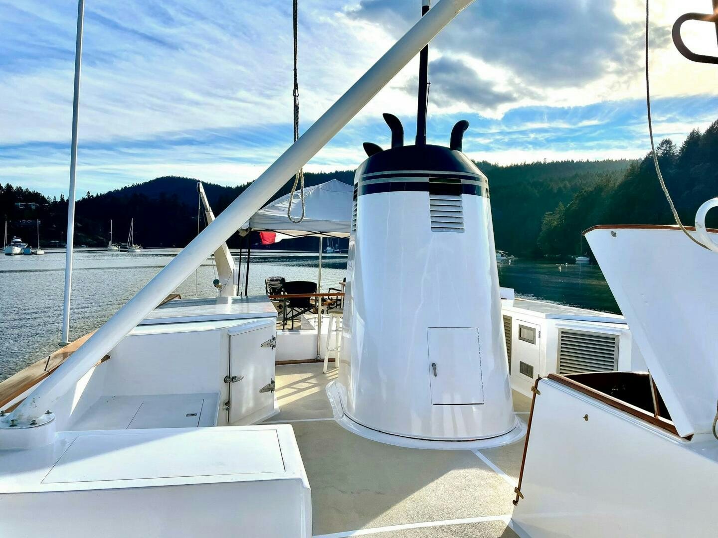 a white boat on a dock aboard PIONEER Yacht for Sale