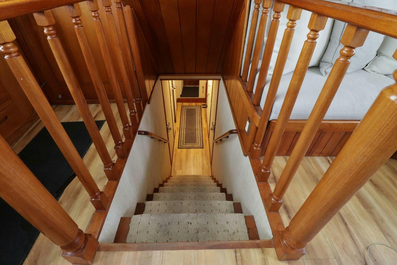 a wooden house with a staircase aboard PIONEER Yacht for Sale