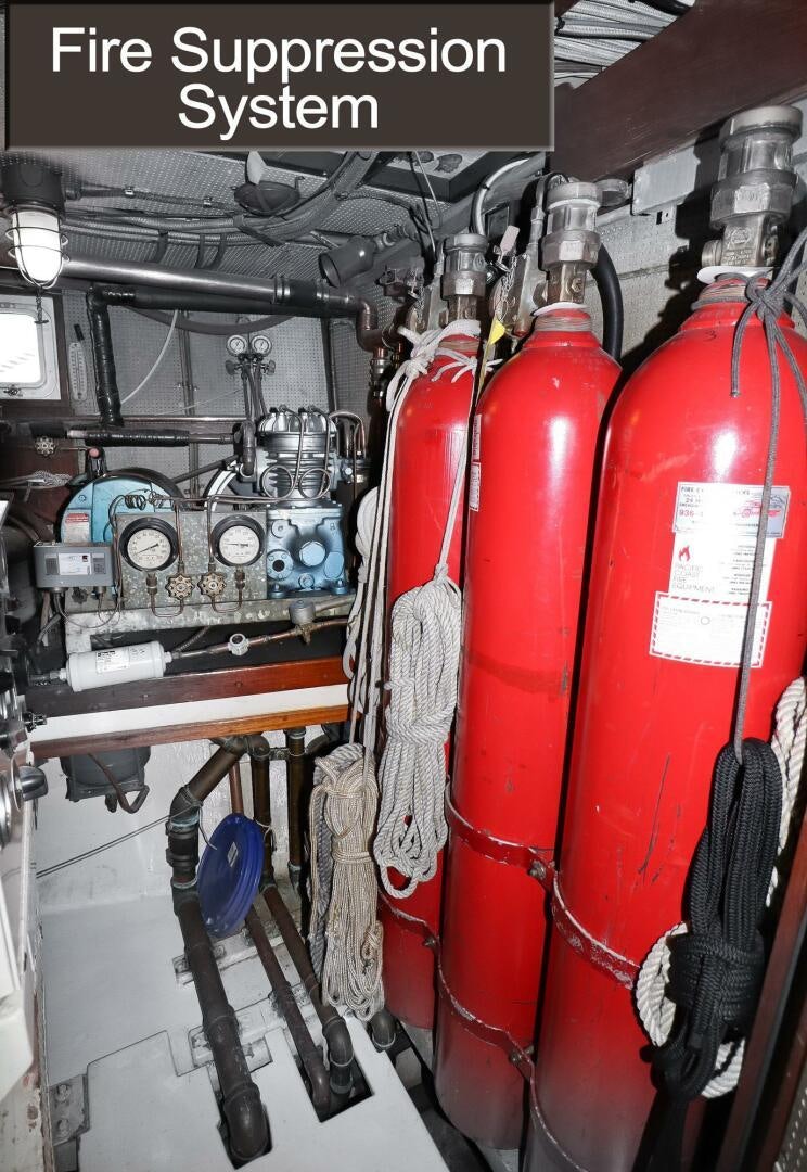 a red and silver canister in a store aboard PIONEER Yacht for Sale