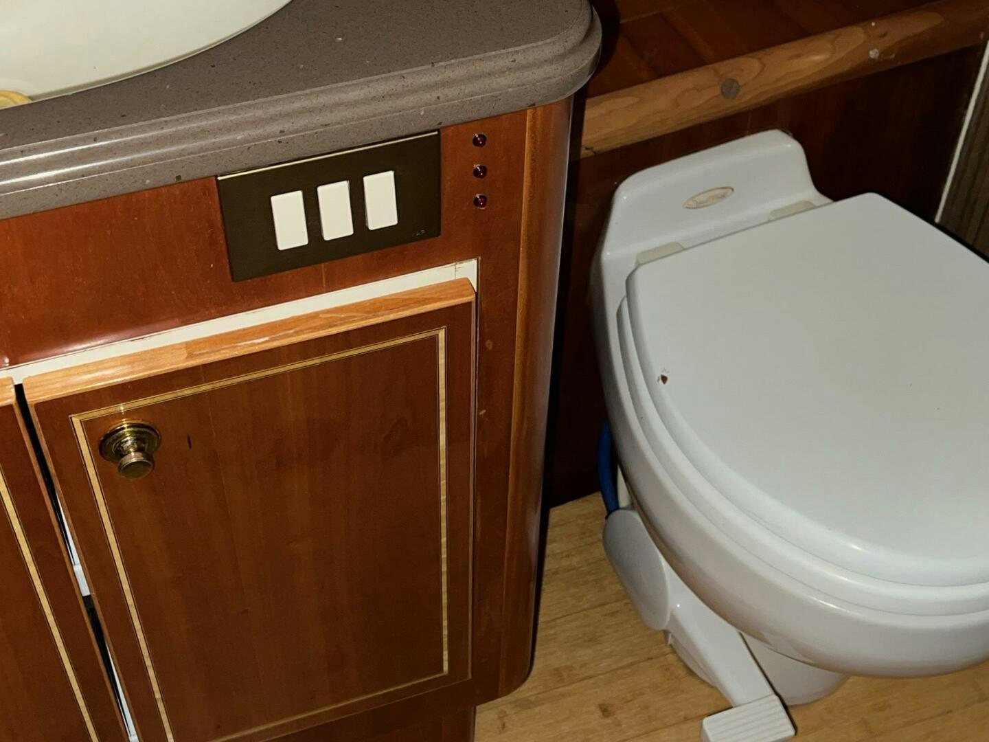 a toilet in a room aboard BUCK-N-BILLS Yacht for Sale