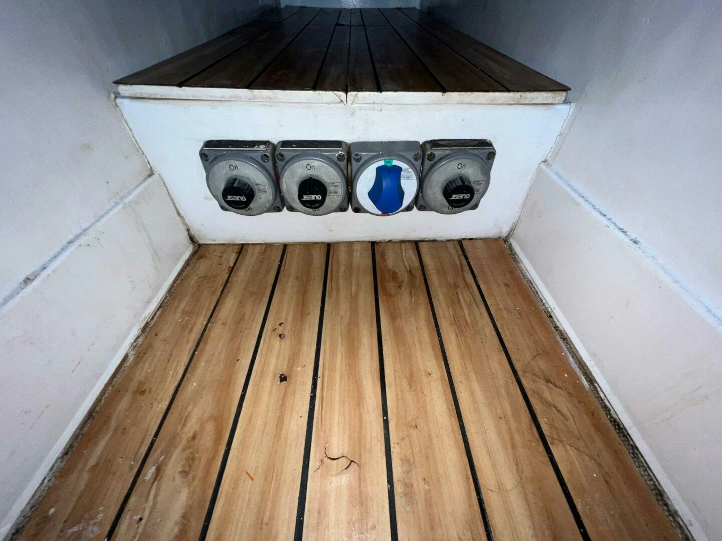 a white stove with a blue knob aboard BUCK-N-BILLS Yacht for Sale