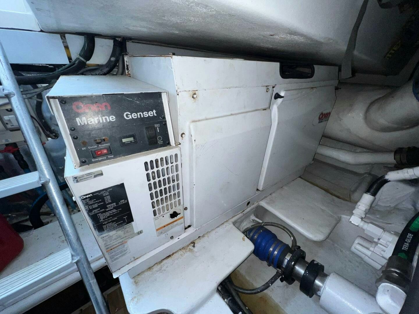 a white vehicle with a screen aboard BUCK-N-BILLS Yacht for Sale