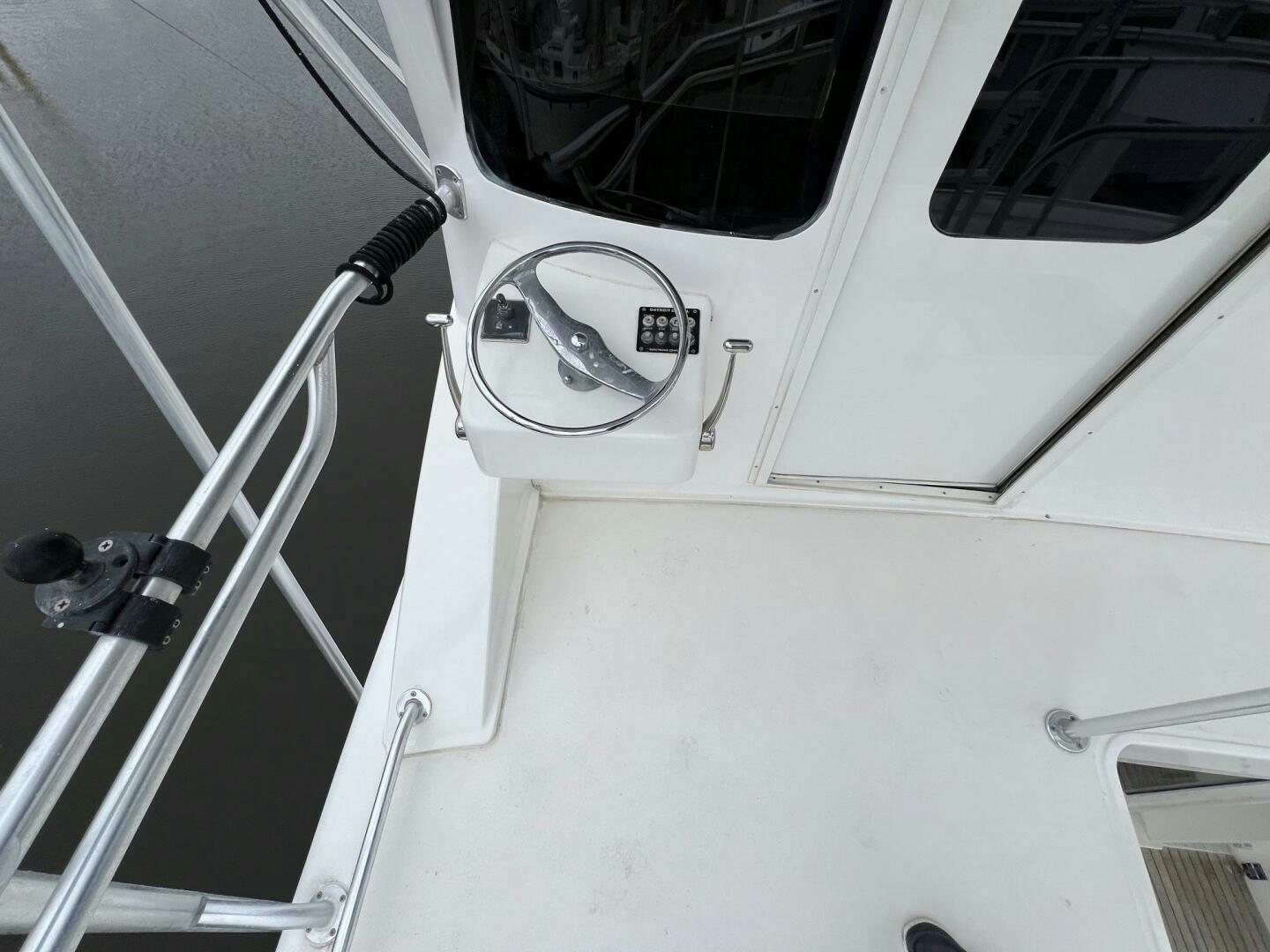 a car door with a door handle aboard BUCK-N-BILLS Yacht for Sale