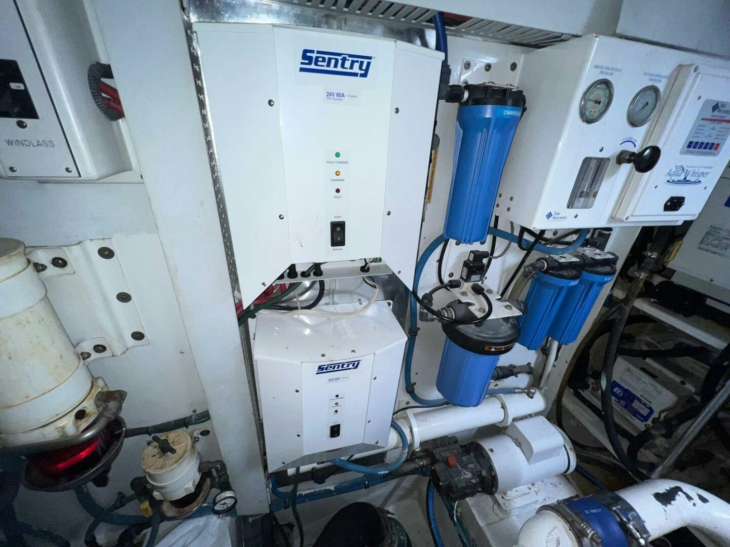 a white machine with blue tubes aboard BUCK-N-BILLS Yacht for Sale