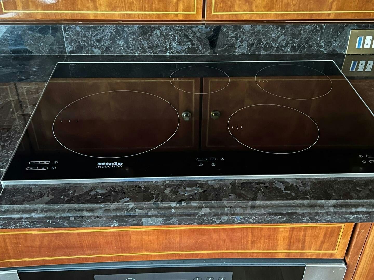 a close-up of a record player aboard BUCK-N-BILLS Yacht for Sale