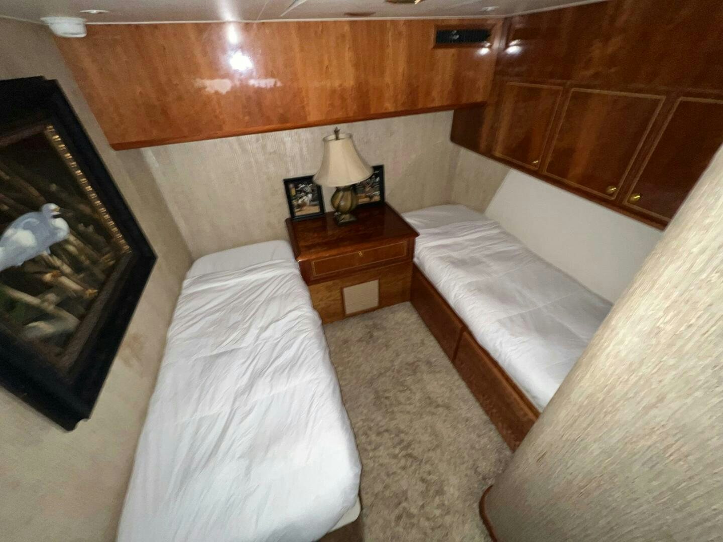 a room with two beds aboard BUCK-N-BILLS Yacht for Sale