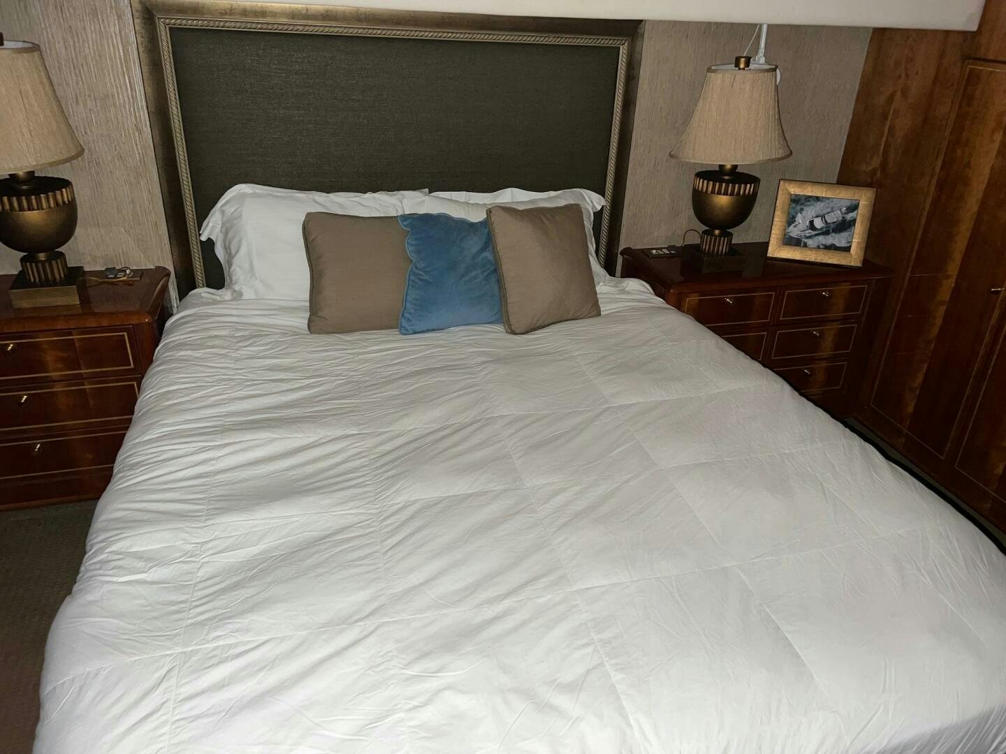 a bed with white sheets aboard BUCK-N-BILLS Yacht for Sale