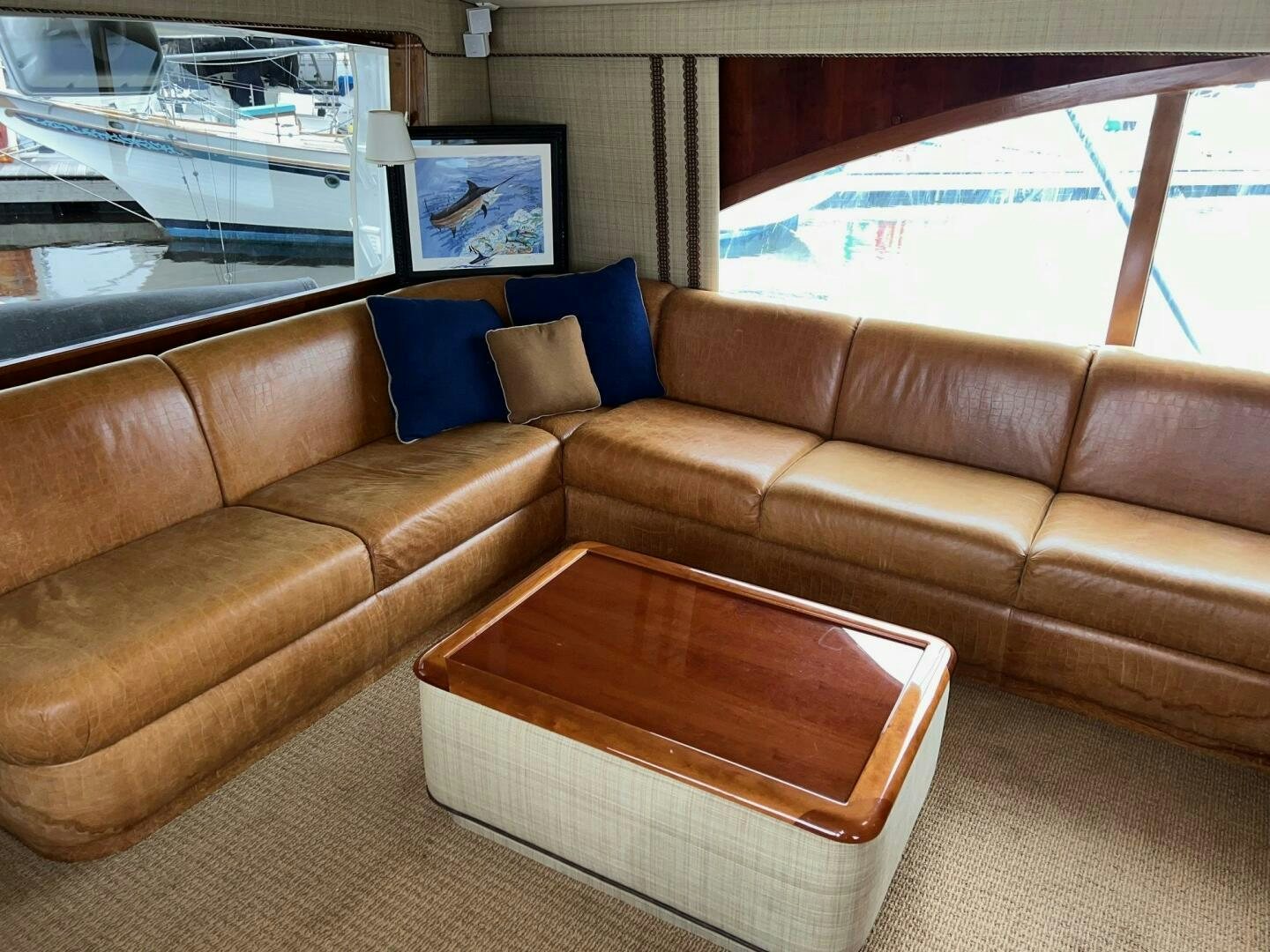a couch in a living room aboard BUCK-N-BILLS Yacht for Sale