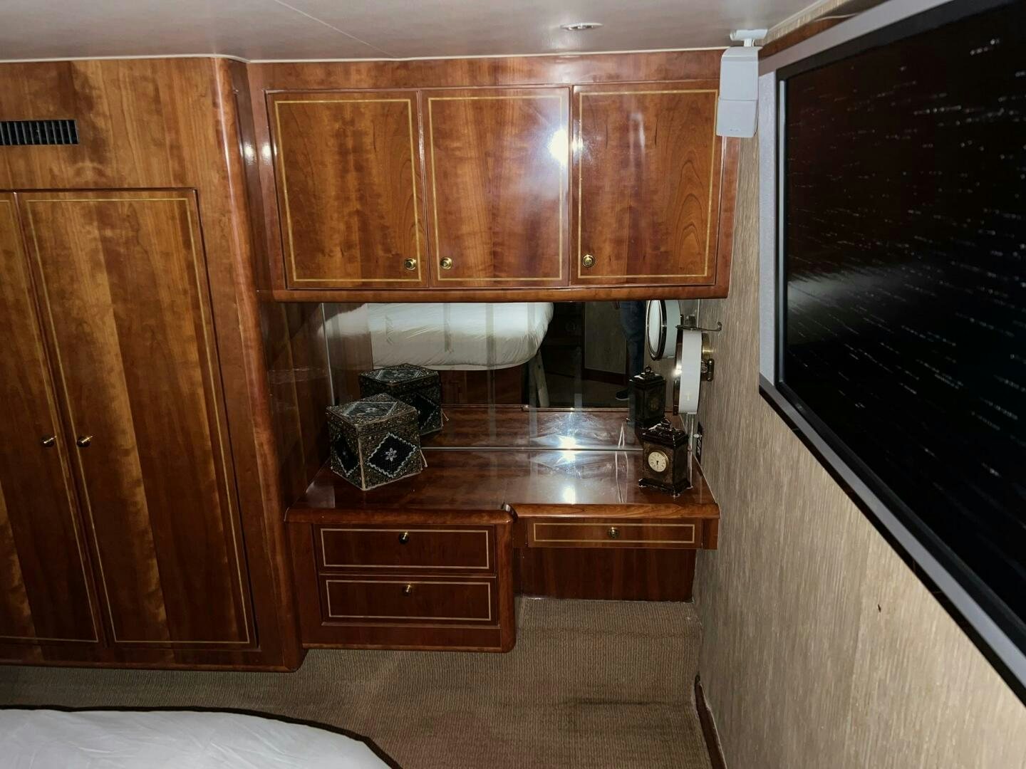 a kitchen with wooden cabinets aboard BUCK-N-BILLS Yacht for Sale