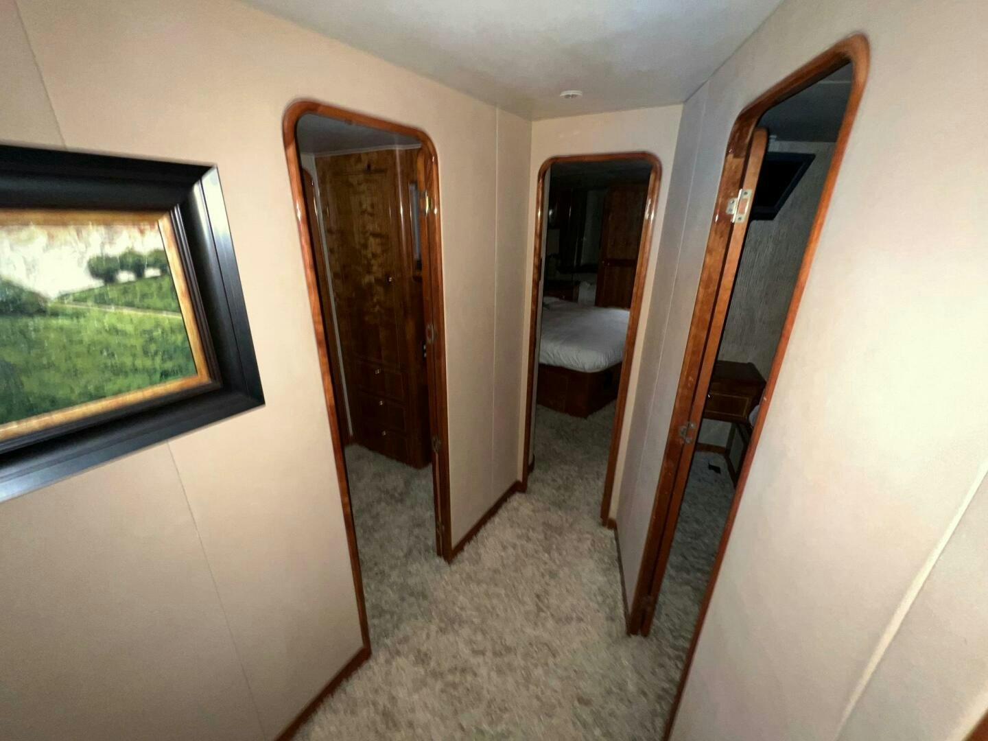 a hallway with a door and a window aboard BUCK-N-BILLS Yacht for Sale
