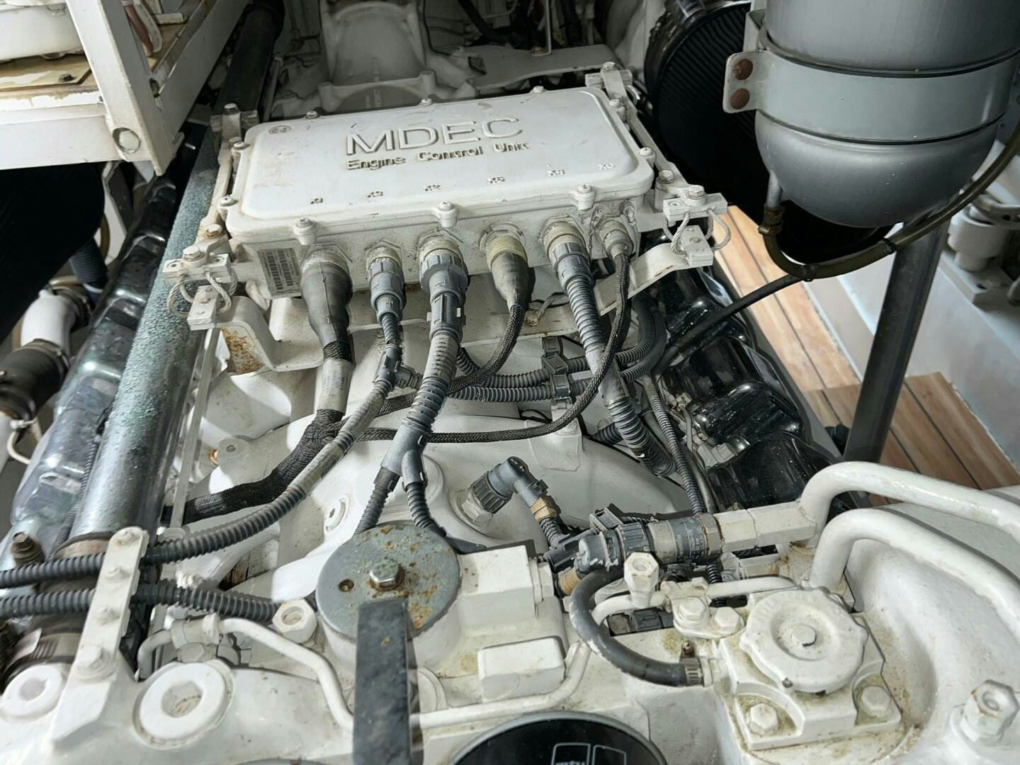a close-up of a car engine aboard BUCK-N-BILLS Yacht for Sale