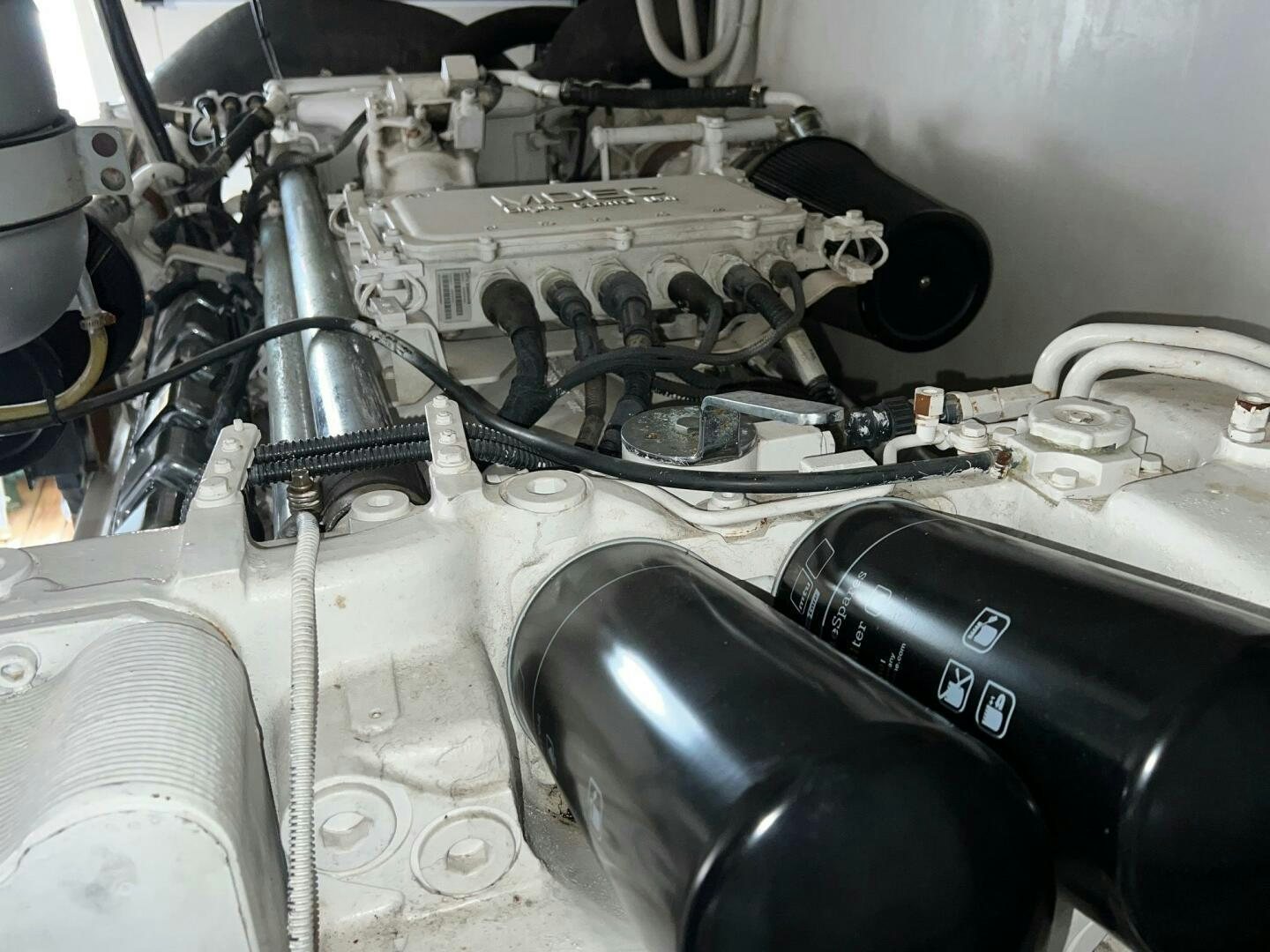 a car engine with a black handle aboard BUCK-N-BILLS Yacht for Sale