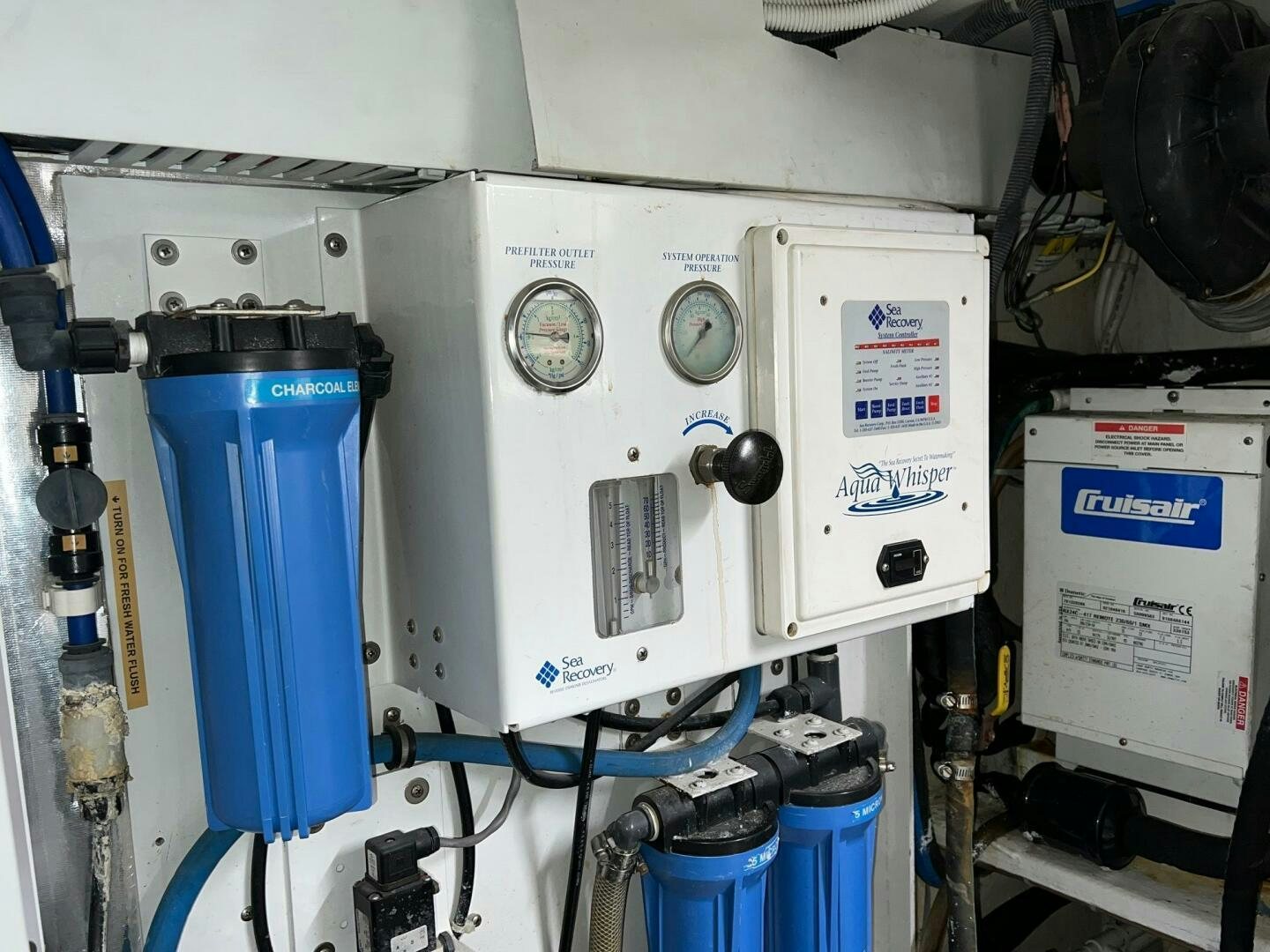 a machine with a blue container aboard BUCK-N-BILLS Yacht for Sale